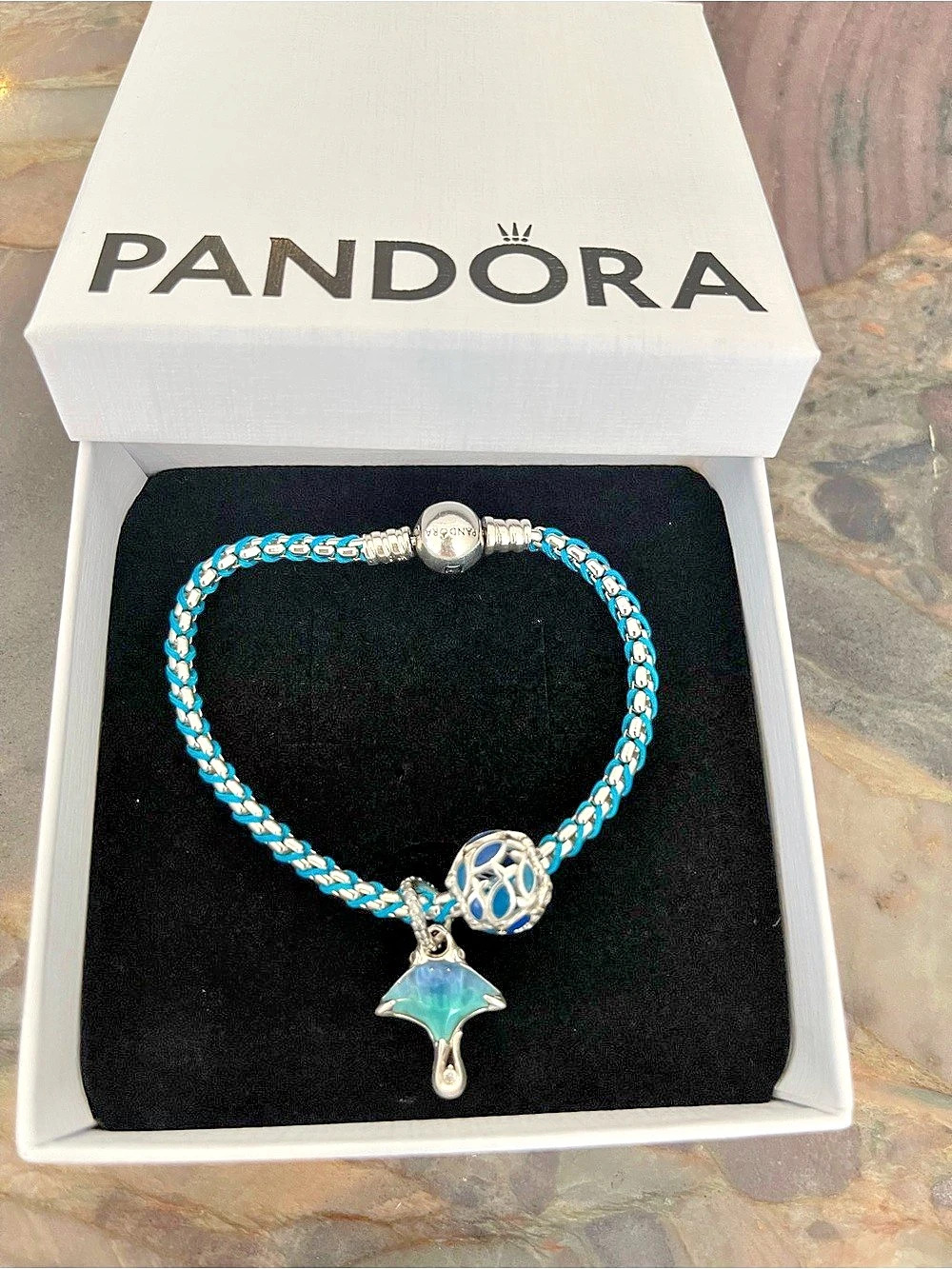 New Pandora Blue Cord Snake
Chain Bracelet with two PANDORA Charms
